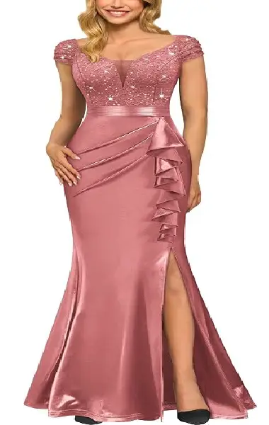 A model wearing a floor-length, dusty rose-colored mermaid gown with a sequined floral lace bodice, see-through cap sleeves, and a skirt featuring ruffled trim and a side slit.
