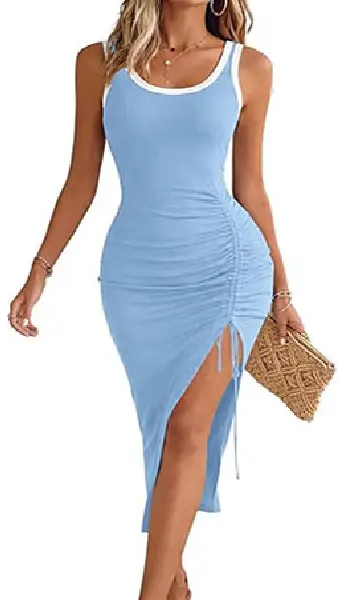 Woman wearing a light blue sleeveless midi tank dress featuring white contrast trim along the scoop neckline and straps, with a side drawstring ruching detail and an adjustable high slit.