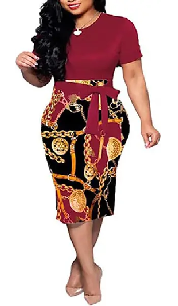 Woman wearing a short-sleeve red top paired with a black and red gold-chain printed pencil skirt featuring a matching tied waist belt.