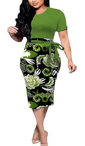 Woman wearing a short-sleeve green top paired with a black and green floral print pencil skirt featuring a matching tied waist belt.