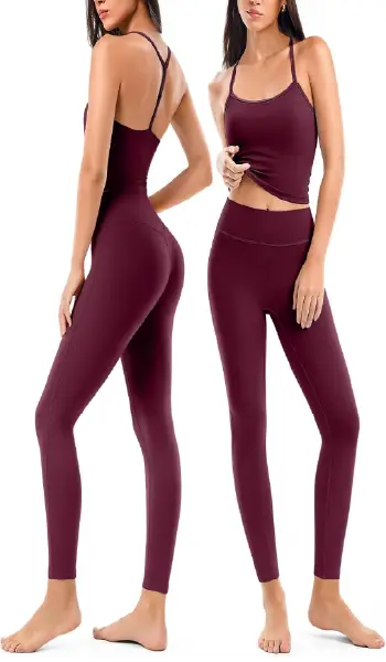 A woman modeling a maroon 2-piece athletic yoga set featuring a Y-back sports bra and high-waisted seamless leggings.