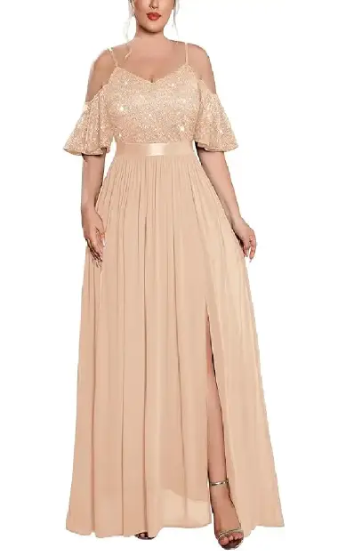 A plus-size model wearing a champagne-colored formal gown with a sequin lace bodice, off-the-shoulder neckline, ruffle short sleeves, and a side slit.