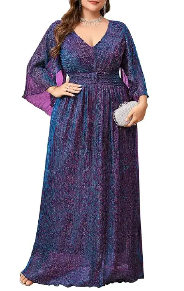 A model wearing a floor-length, multi-colored shimmering plus-size gown featuring a V-neckline, long handkerchief sleeves, and an empire waist with strategic ruching.