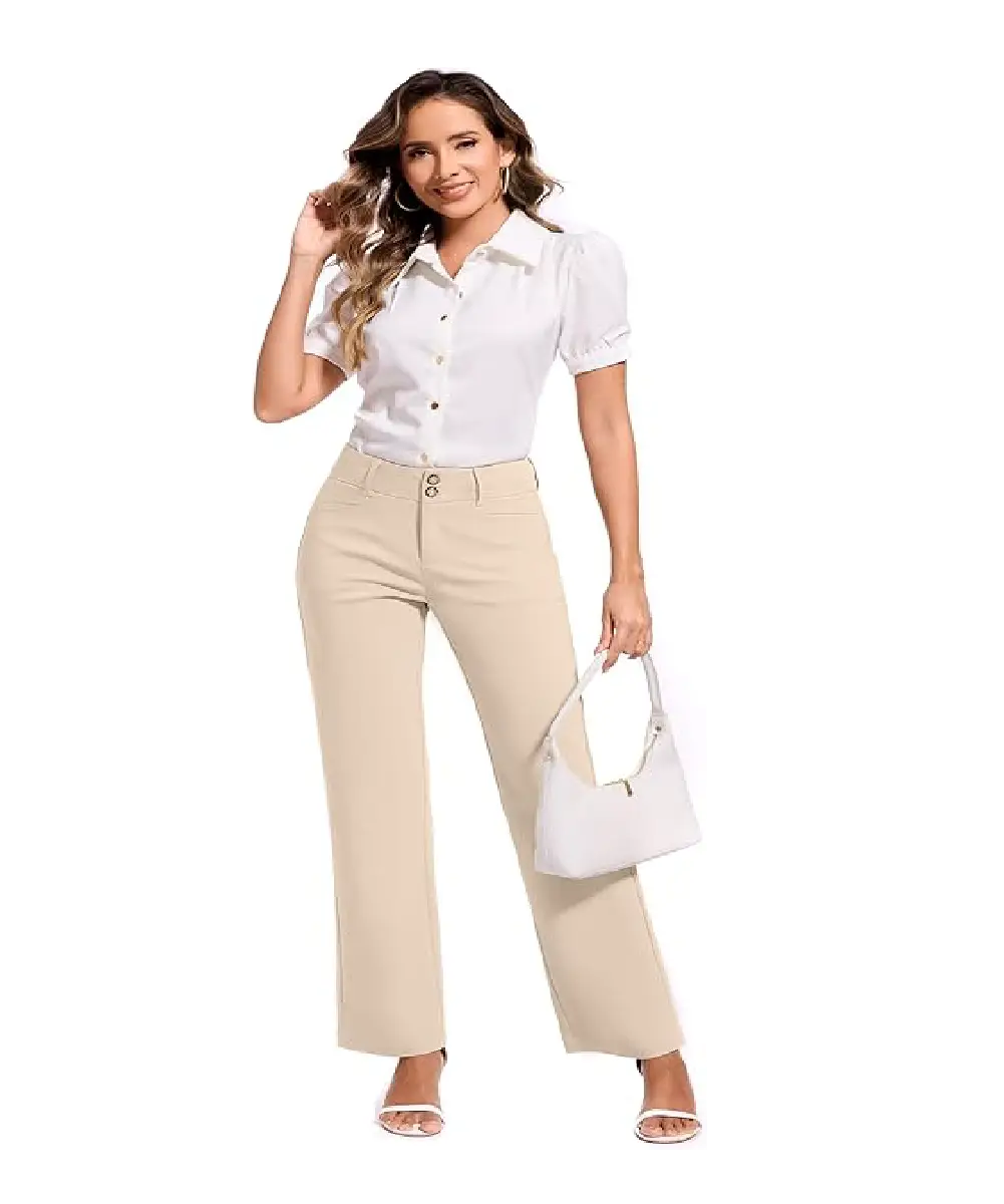 A woman dressed in a white button-down shirt and beige ultra-stretch straight-leg office pants, holding a white handbag.