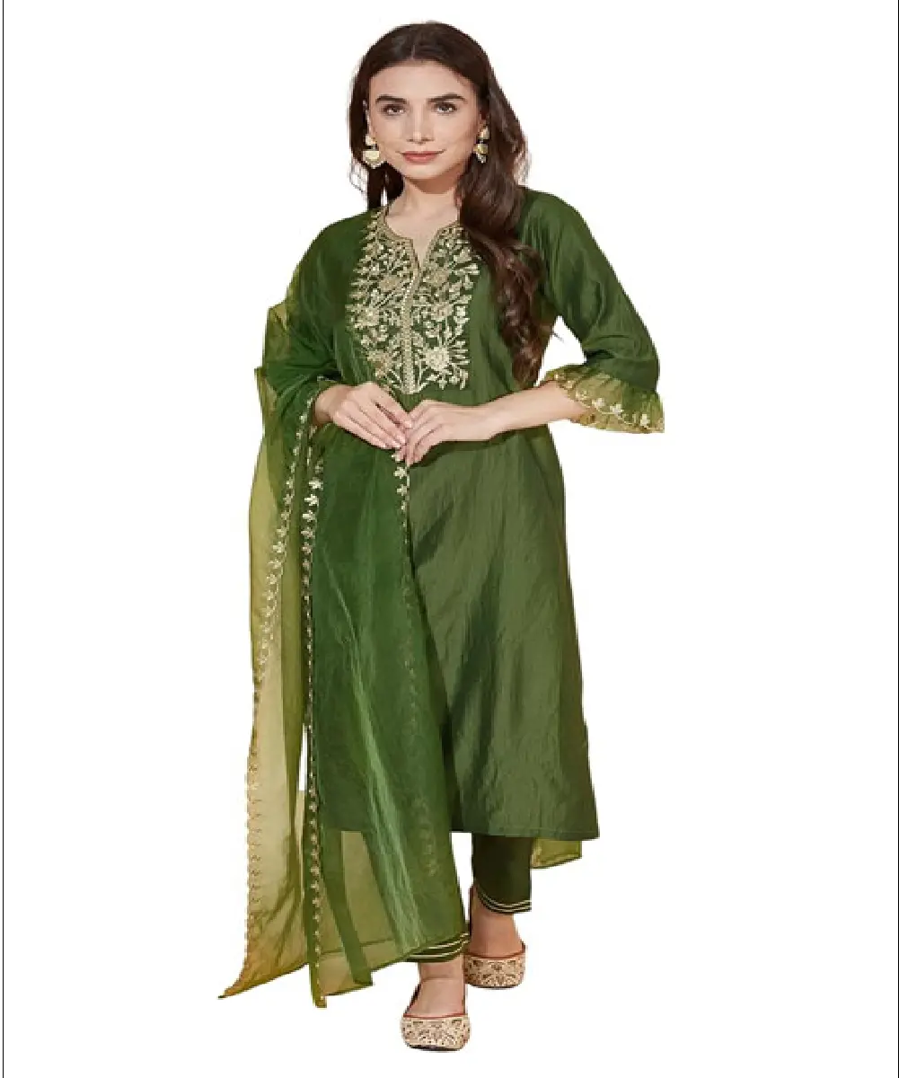 A woman wearing a vibrant mustard yellow georgette Anarkali-style kurta with intricate embroidery, paired with matching pants and a dupatta.