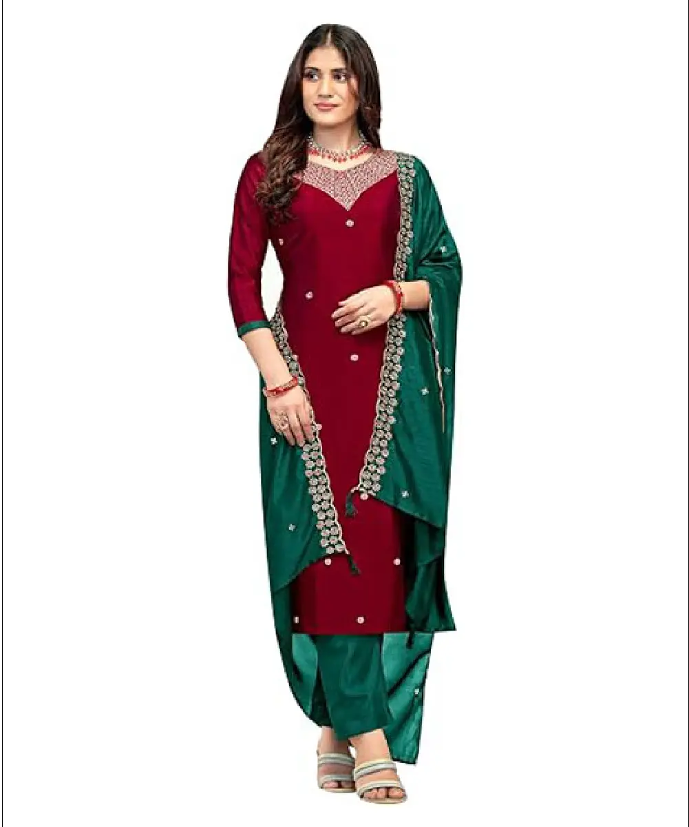 A woman modeling a 3-piece ethnic set featuring a maroon georgette chiffon kameez with hakoba-style chikan embroidery, sequins, and Sarovaski stone work, paired with green straight-fit crepe pants and a matching tie-dye chiffon dupatta.