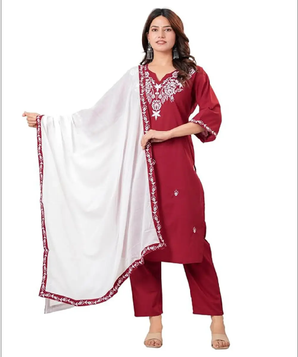 A woman modeling a ready-to-wear 3-piece teal blue ethnic set, featuring an intricately designed kurta, matching palazzo pants, and a coordinated dupatta.
