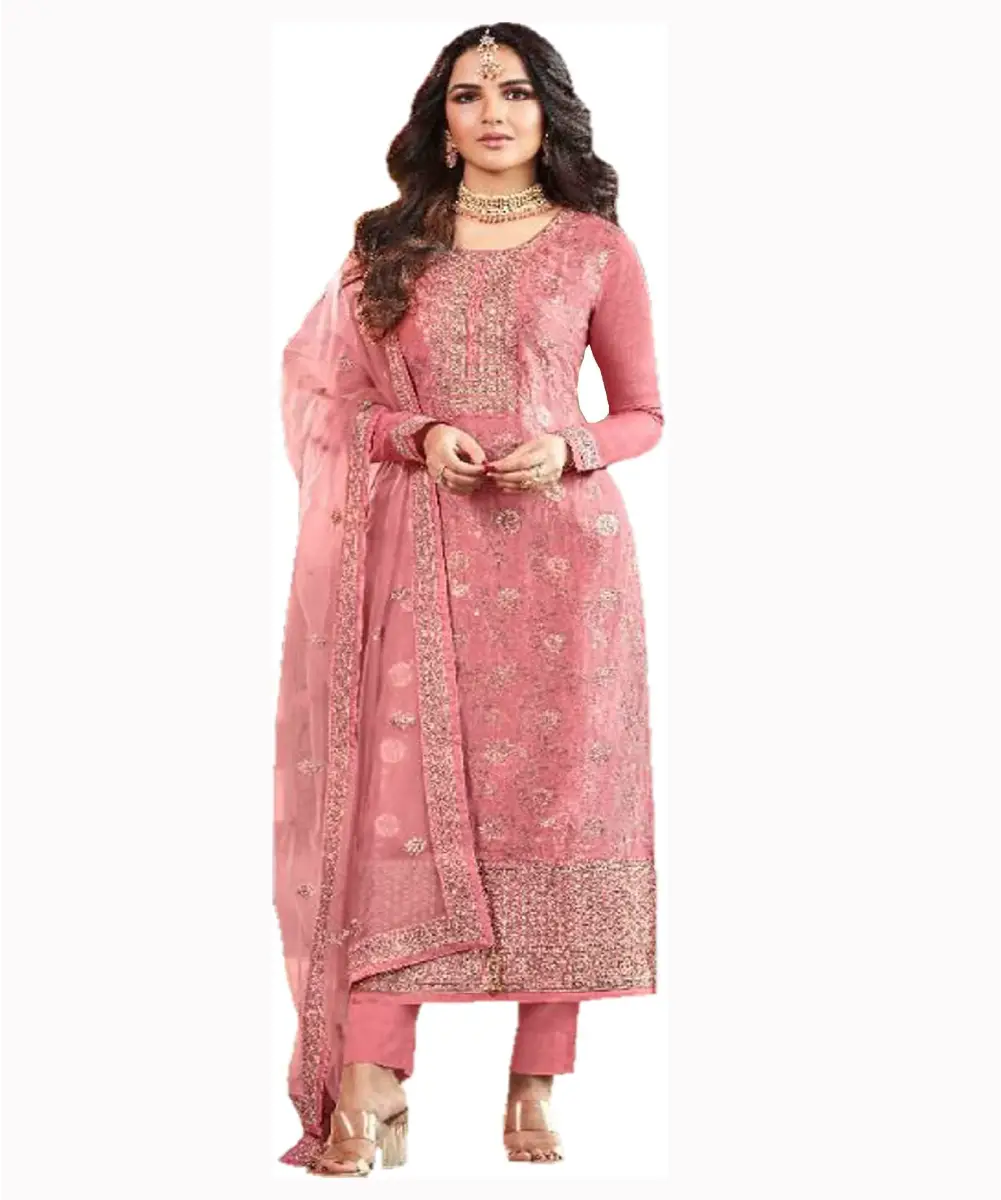 A model is wearing a pink embroidered salwar kameez and palazzo set.