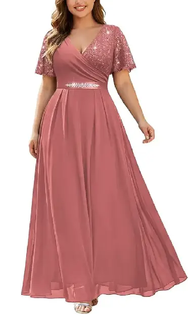 A plus-size model wearing a dusty rose formal maxi dress with a wrap V-neck, sequin lace butterfly sleeves, and a rhinestone ribbon waist.