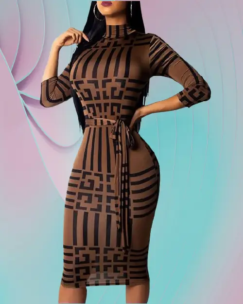 A woman wearing a brown midi dress with geometric patterns and long sleeves.