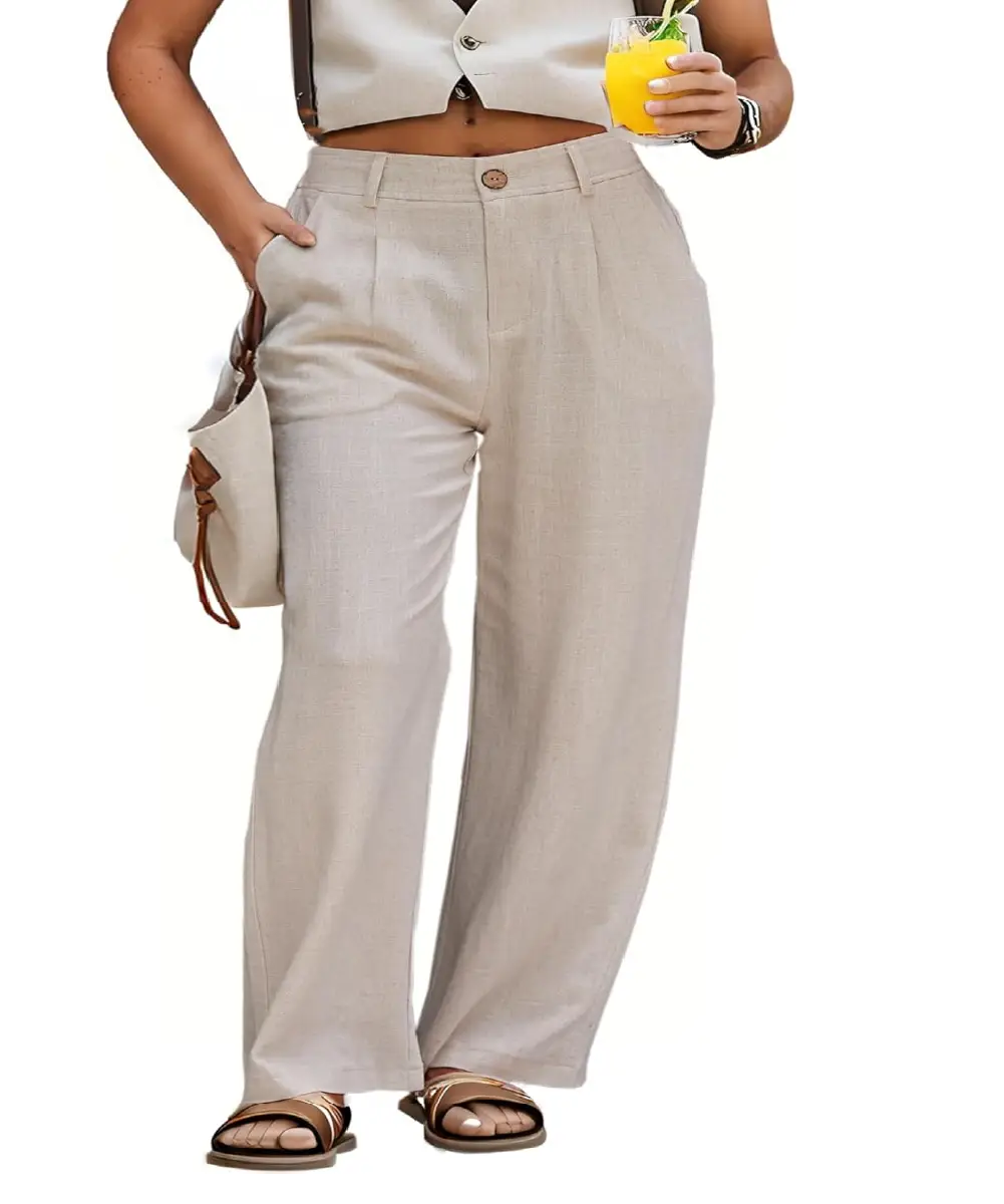 A woman wearing beige high-waisted pleated linen blend pants with real side pockets, styled with a white crop top and sandals for a summer look.