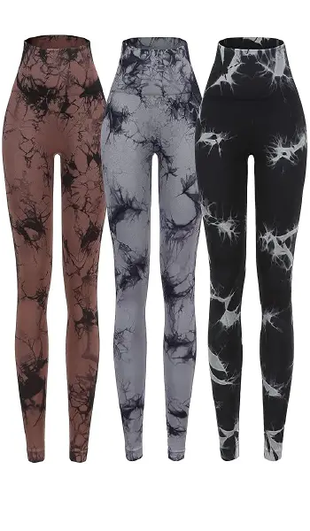 Three pairs of high-waisted seamless leggings displayed together, featuring unique tie-dye patterns in brown, grey, and black.