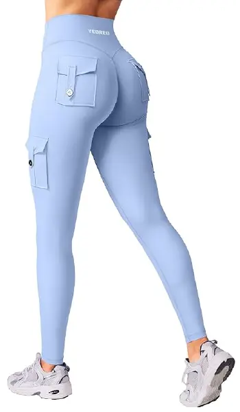 A woman modeling black, high-waisted, buttery-soft leggings that feature a unique "jean-look" design with white-stitched back pockets.