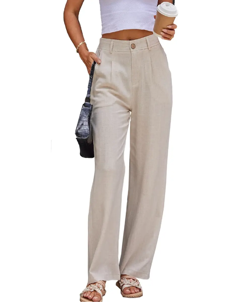 A woman wearing beige high-waisted pleated linen blend pants with real side pockets, styled with a white crop top and sandals for a summer look.