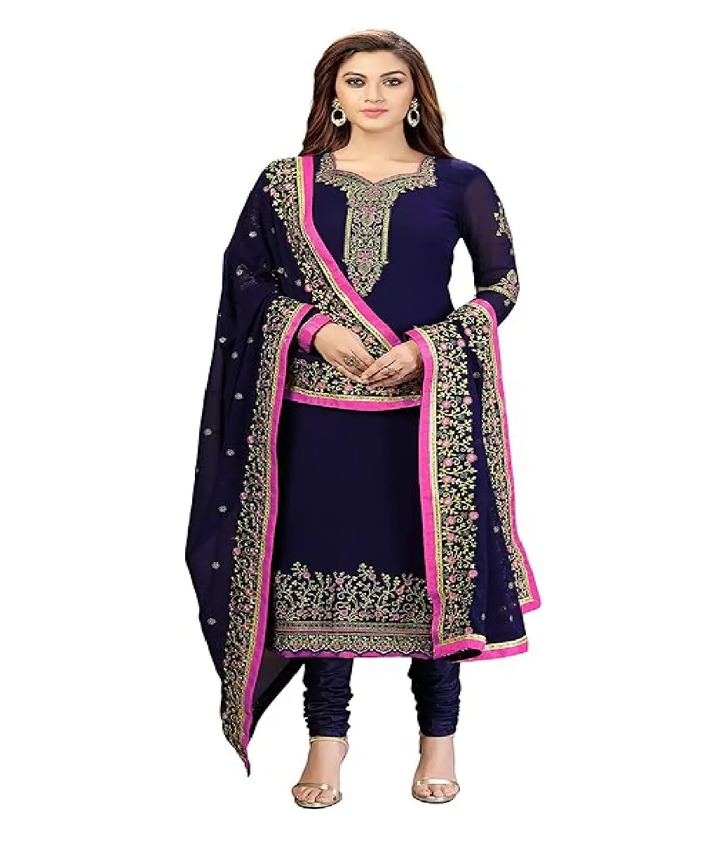 A woman wearing a vibrant teal green georgette Anarkali-style kurta with detailed embroidery, paired with matching pants and a decorative dupatta.