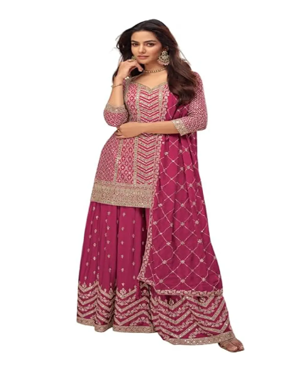 A model is wearing a dark pink Chinese sharara suit with embroidery and sequin work.