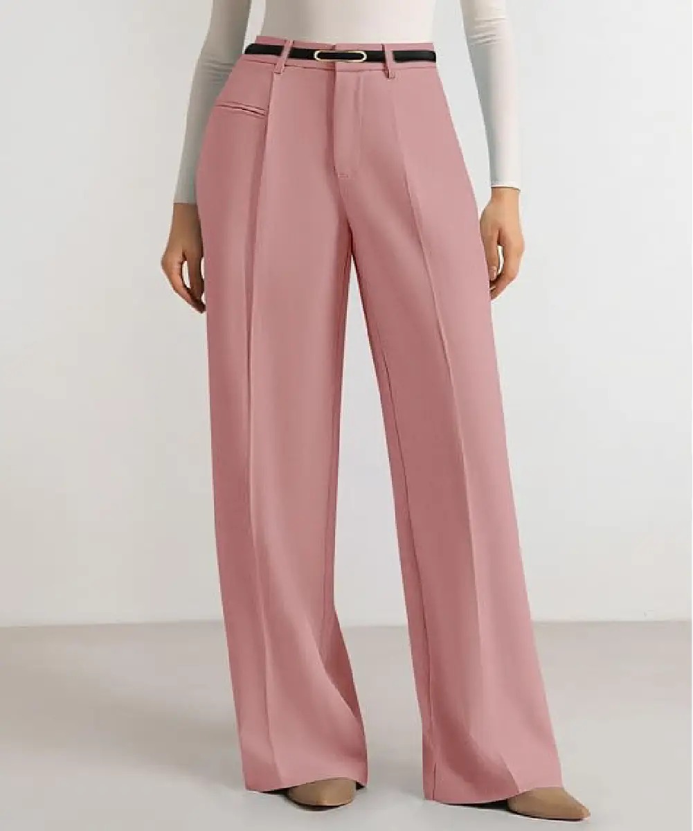 A woman wearing dusty pink high-waisted wide-leg dress pants with a belt, styled for a professional business casual look.
