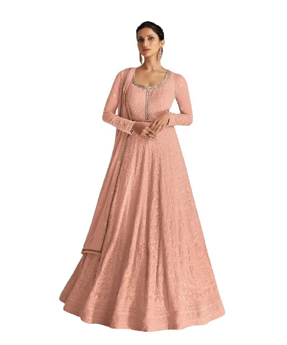 A model is wearing a peach-colored embroidered georgette anarkali suit.