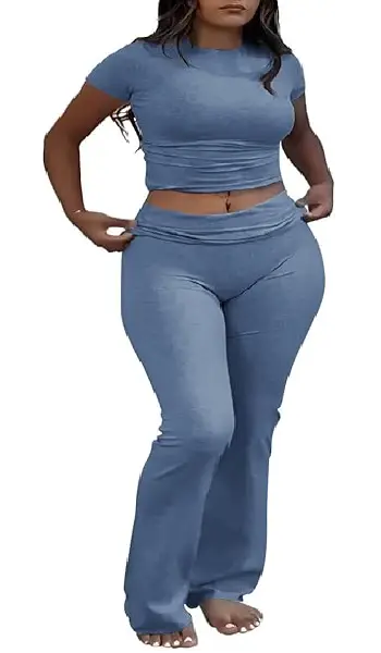 A woman modeling a blue 2-piece lounge set, featuring a slim-fit short sleeve top and trendy low-rise flare leggings.