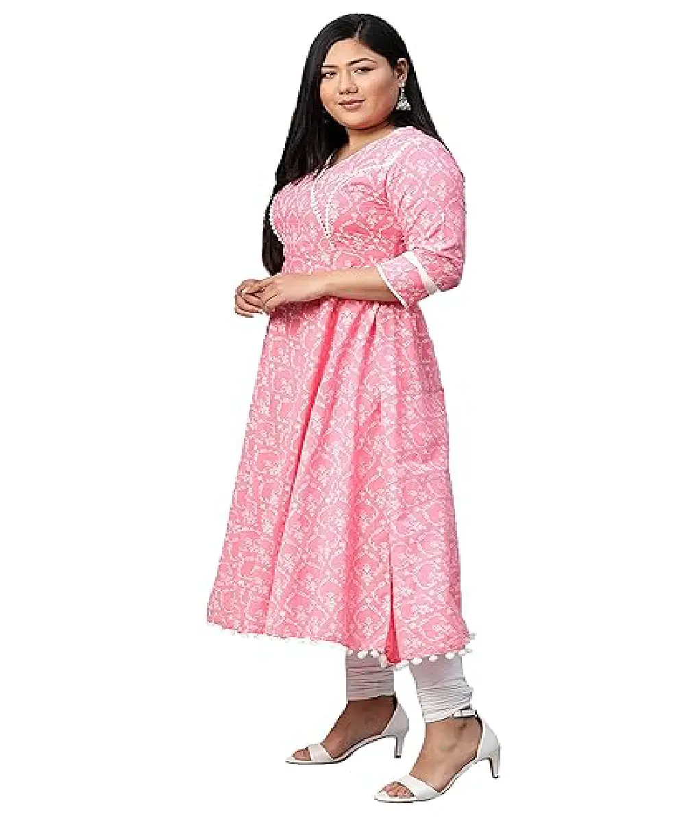 A model is wearing a pink floral printed Anarkali kurti.