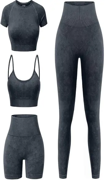 A set of lavender 4-piece seamless athletic wear, including a short sleeve crop top, sports bra, high-waisted biker shorts, and leggings.