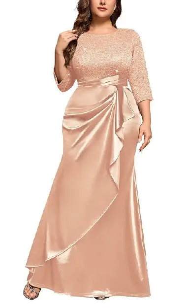 A plus-size model wearing a peach-colored floor-length gown with a sequin lace bodice, 2/3 length sleeves, a round neckline, and a satin skirt featuring ruched ruffle trim and a mermaid hemline.