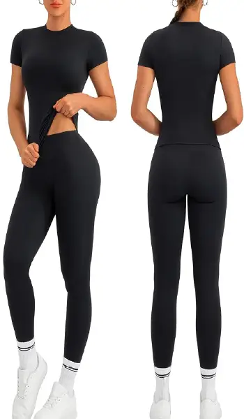 A woman modeling a purple 2-piece workout set featuring a short-sleeve crew neck shirt and matching high-rise, no-front-seam leggings.