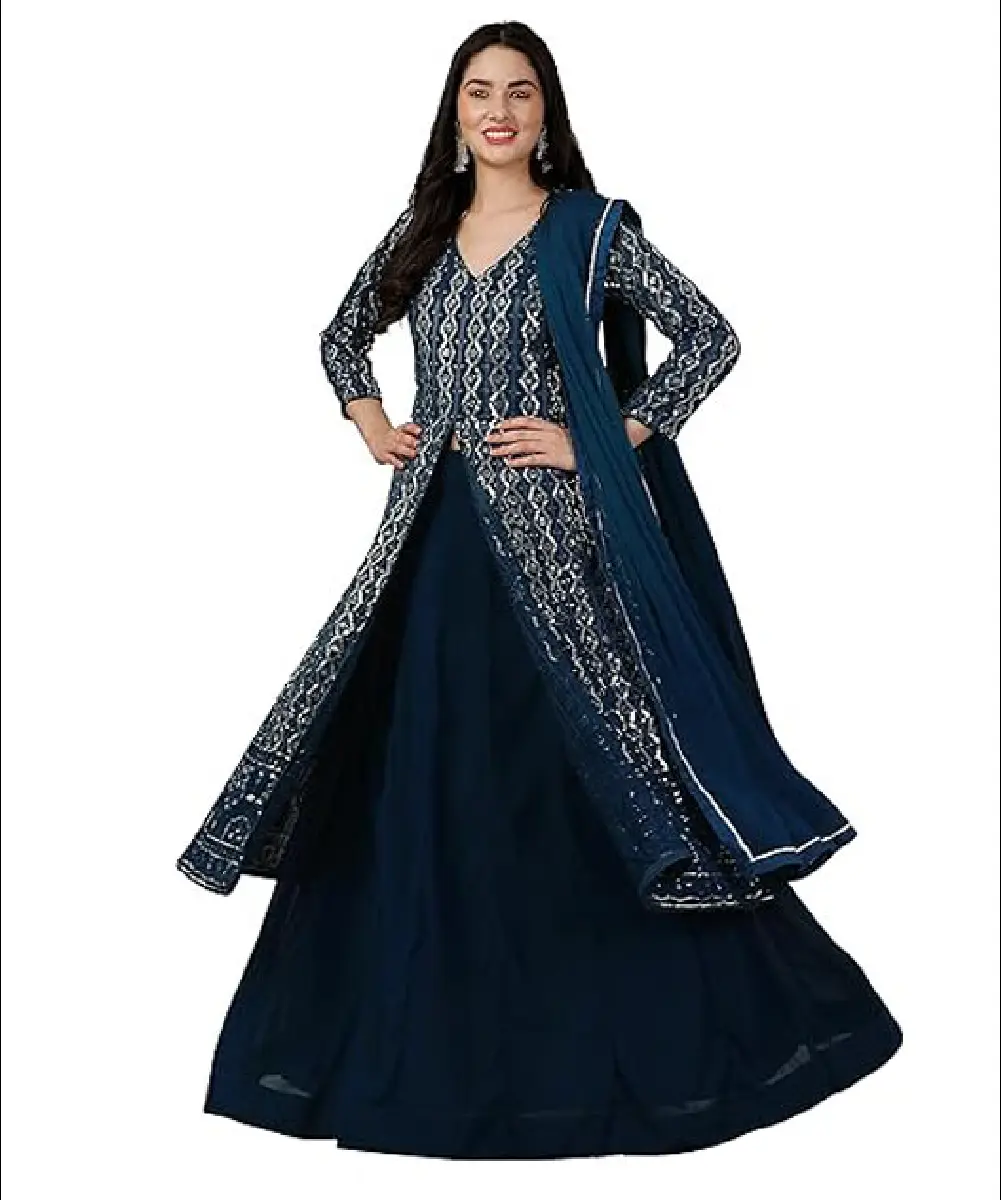 A woman wearing a stunning teal blue Anarkali front slit kurta and lehenga suit set, featuring intricate sequence embroidery work and a matching Nazmeen dupatta.