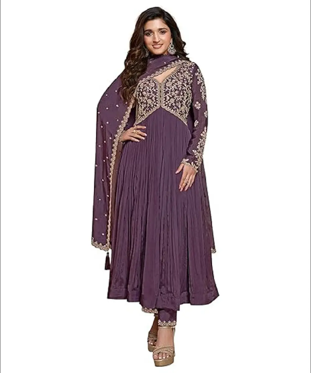 A woman wearing a stylish purple Alia cut pleated silk kurta set, featuring intricate floral design, sequin embroidery work, and a matching dupatta.