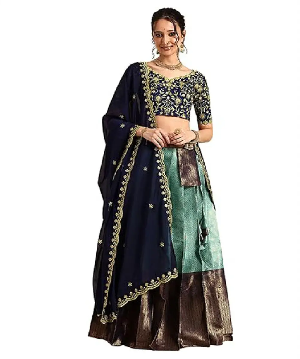 A woman wearing a navy blue and green lehenga choli set made from woven Taffeta Satin, featuring intricate embroidery and a matching navy dupatta.