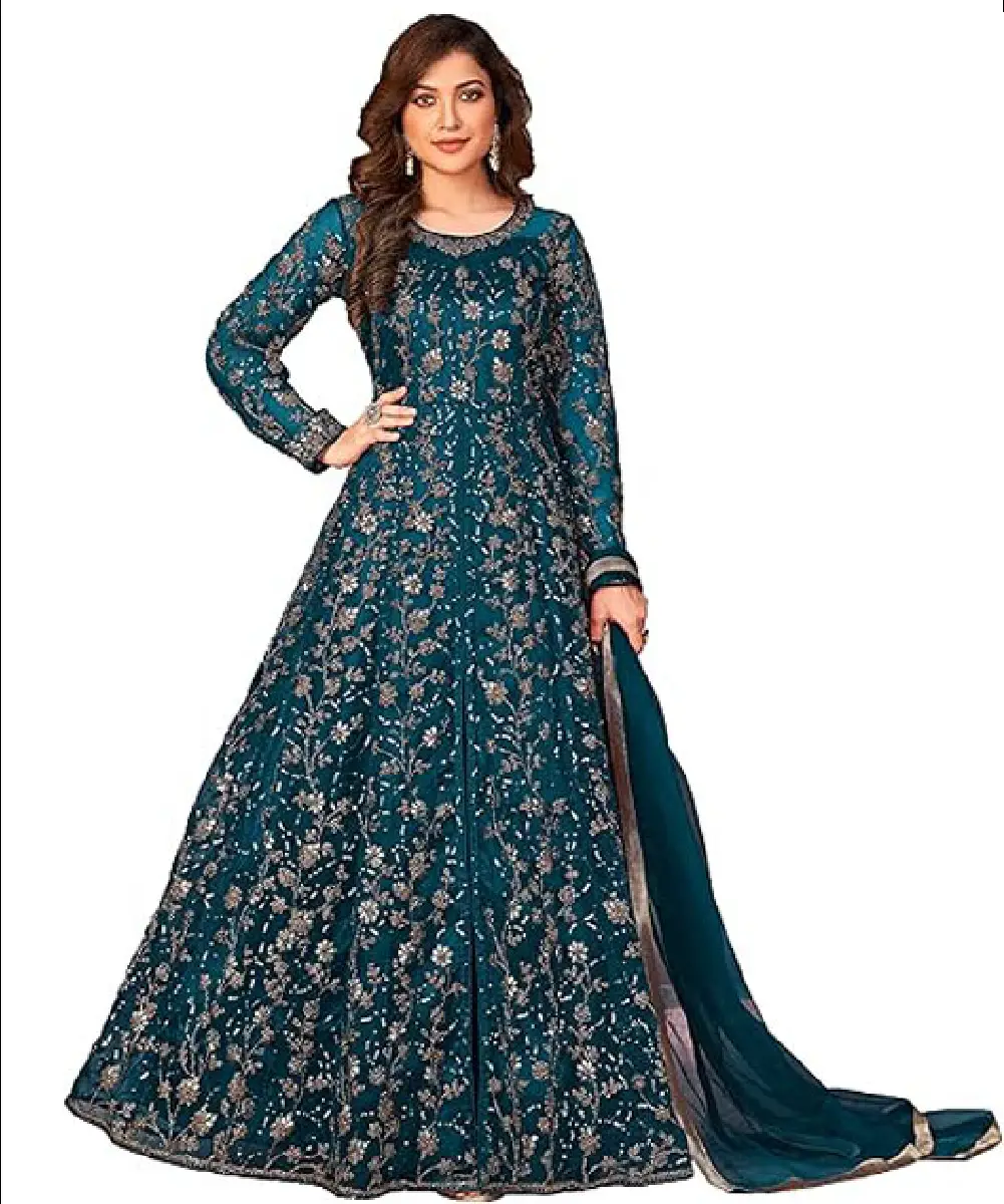 A woman wearing a teal blue heavy net suit featuring intricate embroidery work, paired with a matching heavy net dupatta.