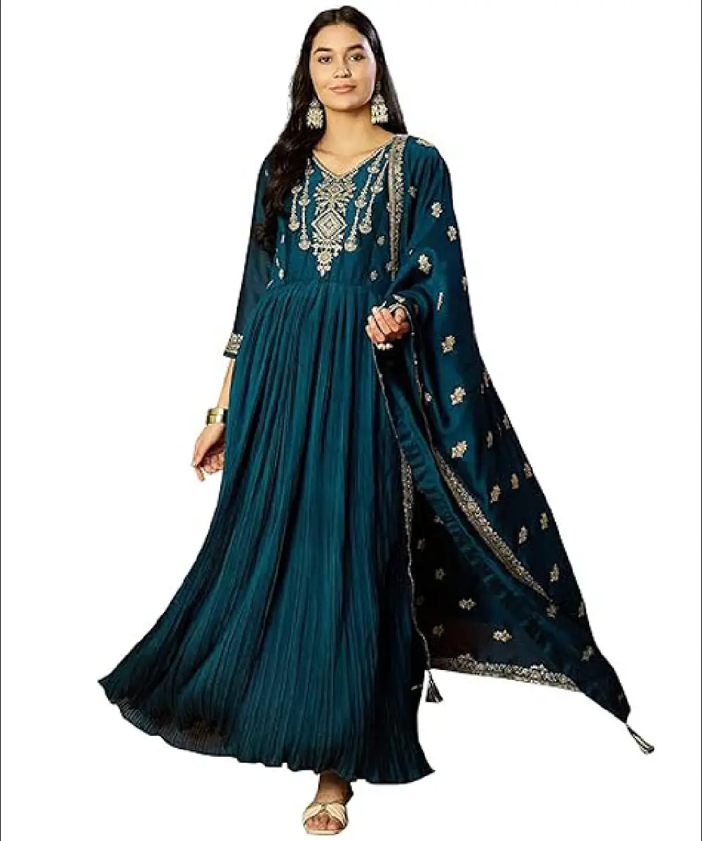 A woman wearing a teal blue Vichitra silk Anarkali kurta pant set featuring geometric design embroidery work and 3/4 sleeves.