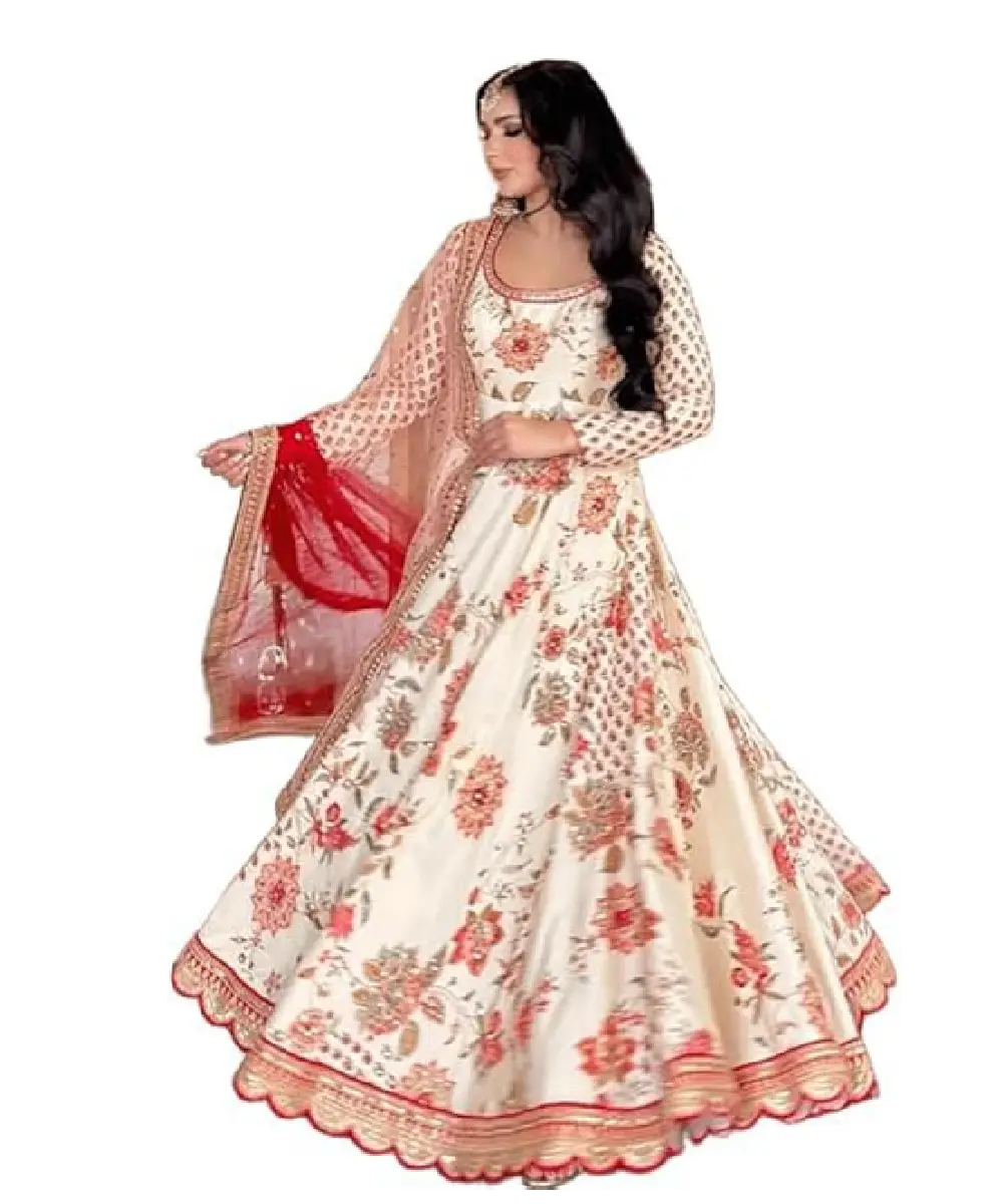 A woman wearing an off-white faux georgette Anarkali-style kurta with vibrant floral prints and a red-bordered dupatta.