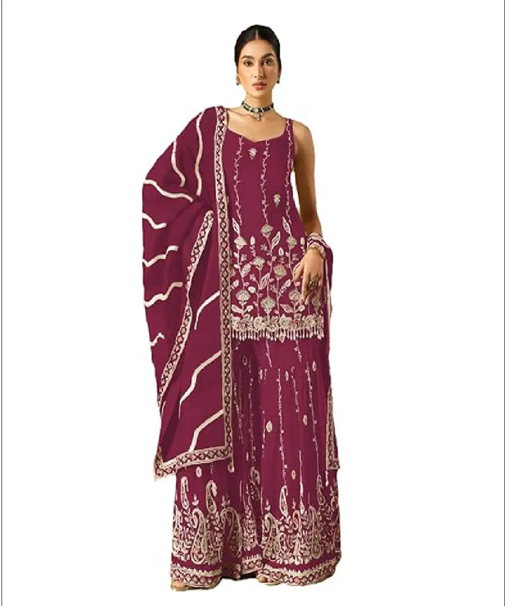A woman wearing a maroon ready-to-wear salwar suit featuring intricate embroidery on the top and bottom, paired with a matching georgette dupatta.