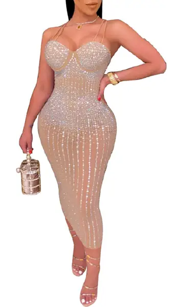 Woman wearing a nude sheer mesh bodycon midi dress covered in sparkling rhinestones and vertical rhinestone stripes, featuring spaghetti straps and a sweetheart neckline.