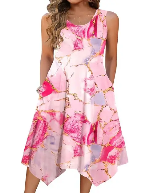 Woman wearing a pink, purple, and white marbled abstract print sleeveless midi dress with a scoop neckline and handkerchief hem.