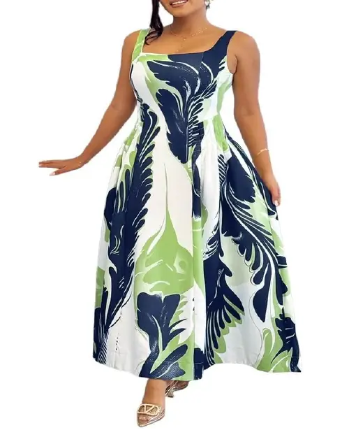Woman wearing a white, navy blue, and green abstract feather print sleeveless maxi dress with a scoop neckline and flared skirt.