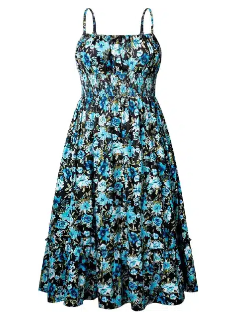 Sleeveless black and bright blue floral print midi dress featuring a smocked bodice and a tiered ruffled hem.