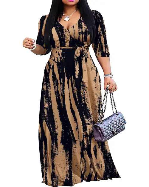 Woman wearing a beige and black vertical tie-dye abstract stripe wrap maxi dress with half sleeves and a waist tie.