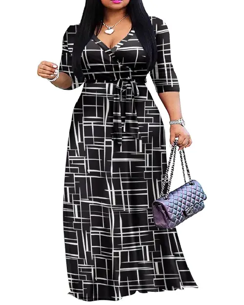 Woman wearing a black and white abstract grid line print wrap maxi dress with half sleeves and a waist tie.