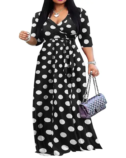 Woman wearing a classic black and white polka dot wrap maxi dress with half sleeves and a waist tie.
