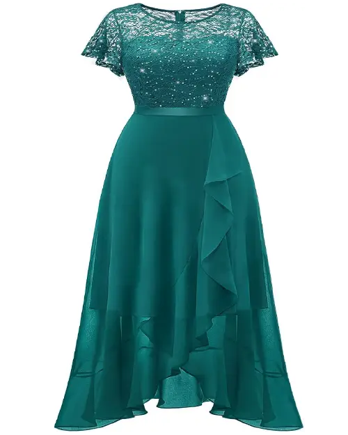 Woman wearing an emerald green lace short sleeve high-low cocktail dress with a ruffled chiffon skirt overlay.