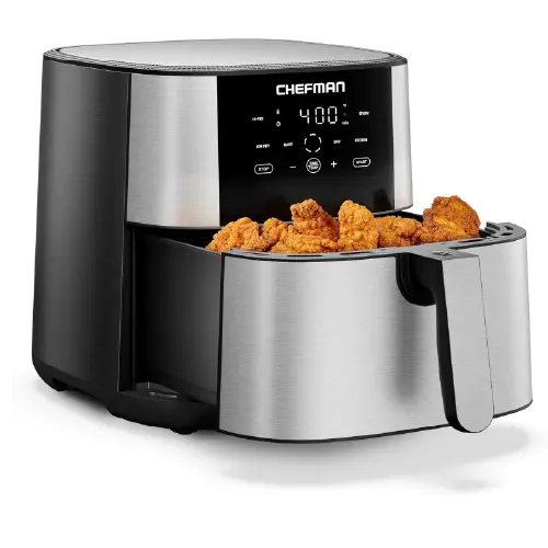 Chefman digital air fryer with a stainless steel and black finish, showing a pull-out basket filled with golden-brown fried chicken wings.