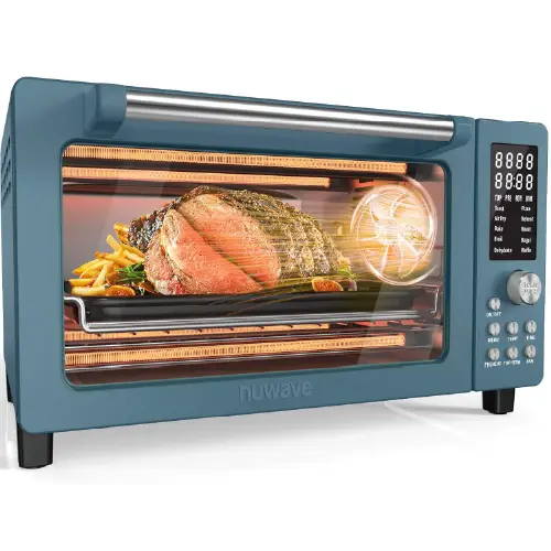 Blue Nuwave digital countertop convection oven featuring a top digital LED display screen, control buttons, and a dial knob on the right, showing a roasted piece of meat and vegetables inside through the glass door.