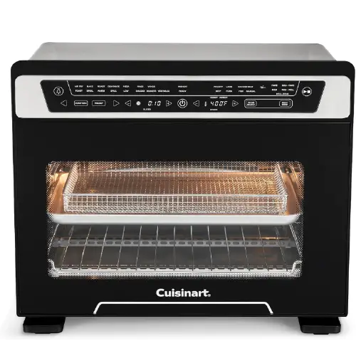 Cuisinart digital air fryer toaster oven with a sleek black body, silver control panel banner along the top, and a wide glass viewing window showing an interior wire mesh air fry basket and oven rack.
