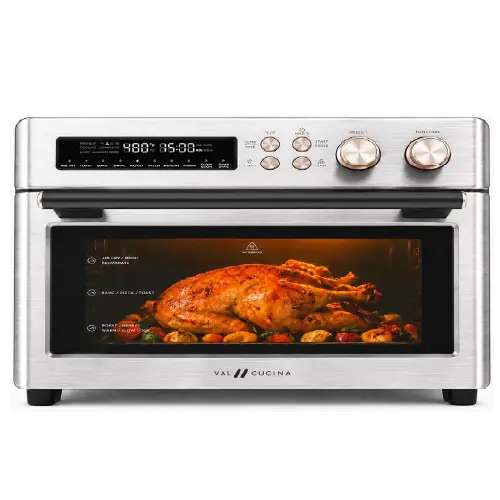 Stainless steel Val Cucina digital toaster oven with a glass door showing a roasted turkey and vegetables, featuring dual control knobs and a digital display panel.