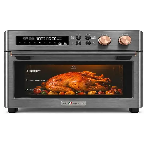 Dark grey metallic Val Cucina digital toaster oven featuring a brushed finish, rose-gold control knobs, and a glass door showing a golden roasted turkey with vegetables.