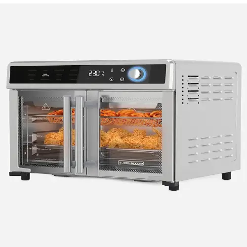 Silver and black Black+Decker dual-door digital air fryer oven with wire racks holding spiral snacks and fried chicken inside separate compartments.