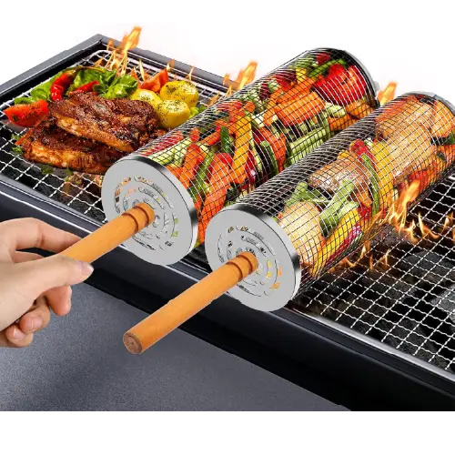 Rolling cylindrical stainless steel grill baskets and grilled meat on a barbecue grill grate over flames.