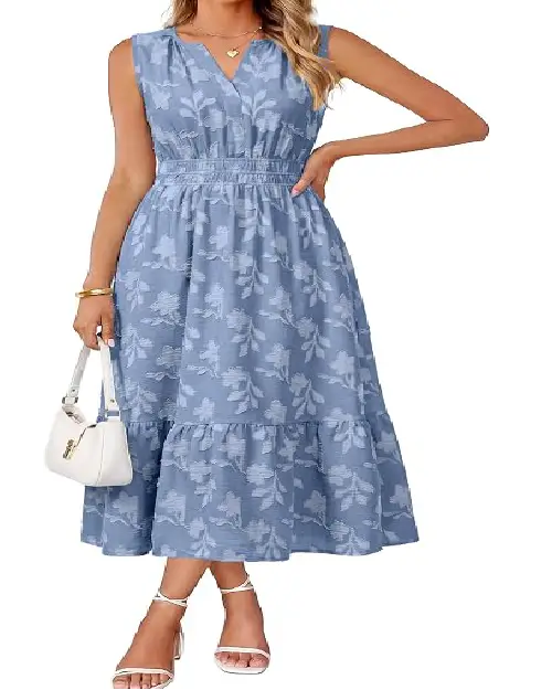 Model in a dusty blue sleeveless midi dress crafted with floral jacquard fabric, featuring a smocked bodice and tiered hemline.